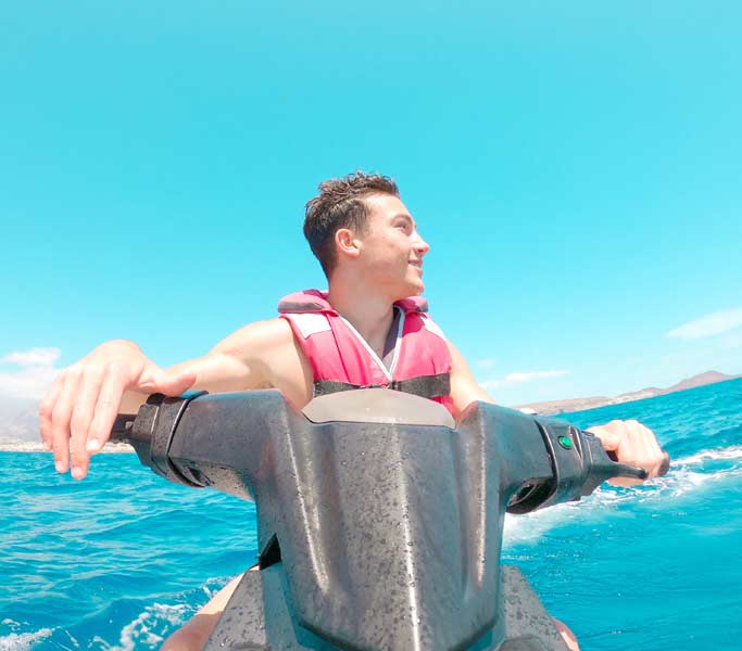 boy on jet ski